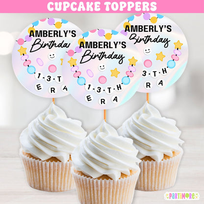 Friendship Bracelet cupcake toppers with colorful bead design and custom text for birthday party desserts.