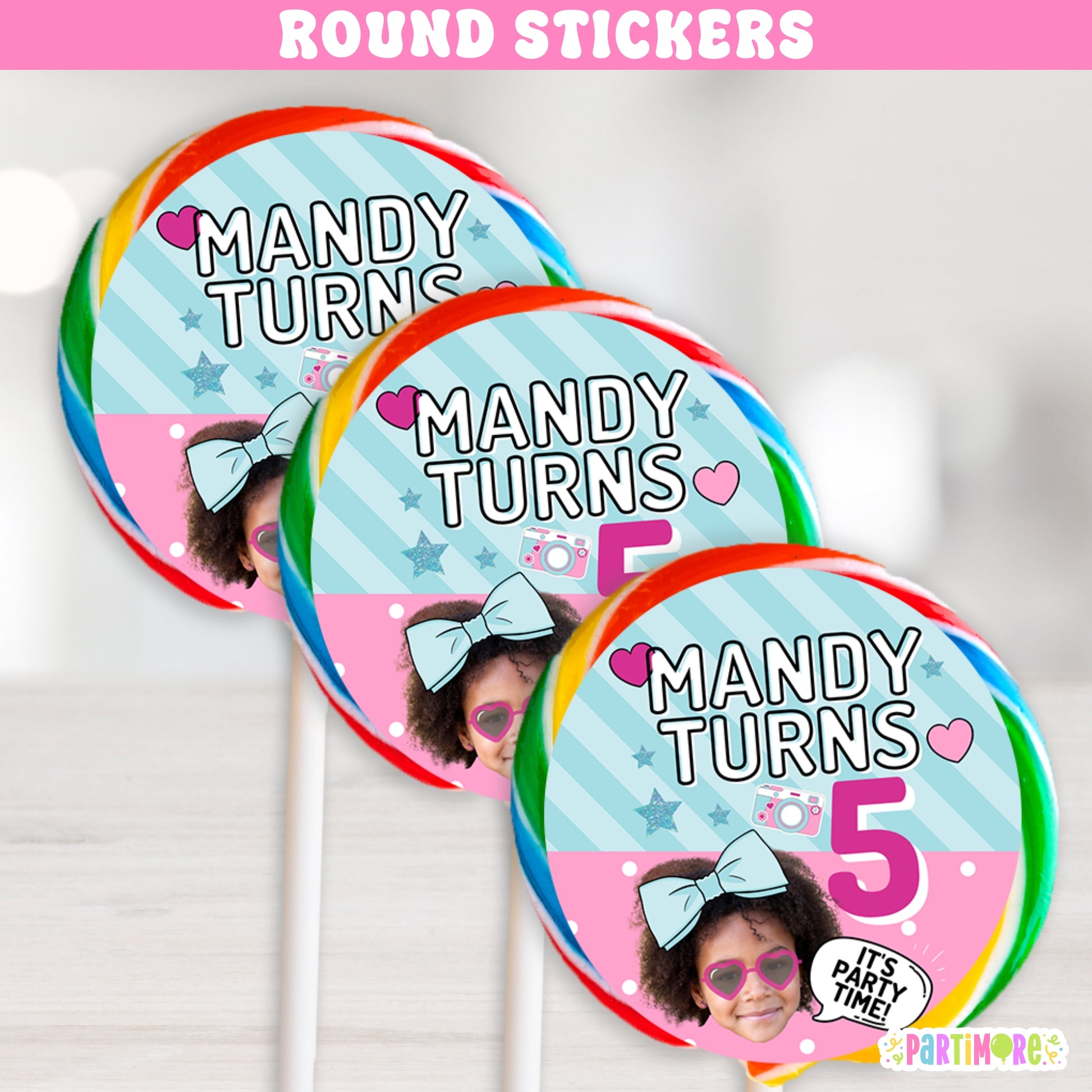 Round lollipop labels featuring glam surprise doll design, big blue hair bow and camera graphic, 'It’s Party Time' custom printed with name and age
