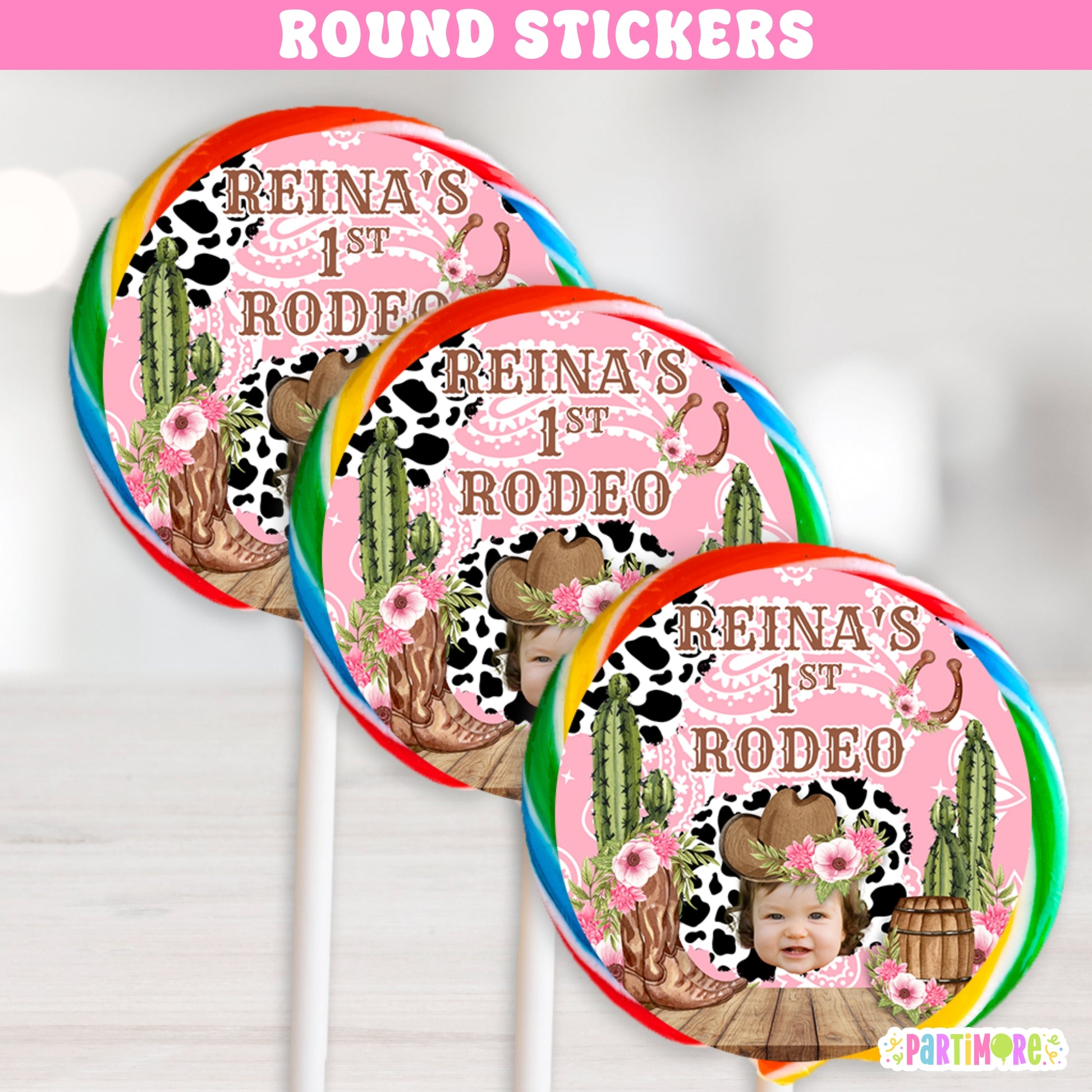 Pink cowgirl round stickers for girl’s first rodeo birthday party, western cow print and floral ranch theme favor labels
